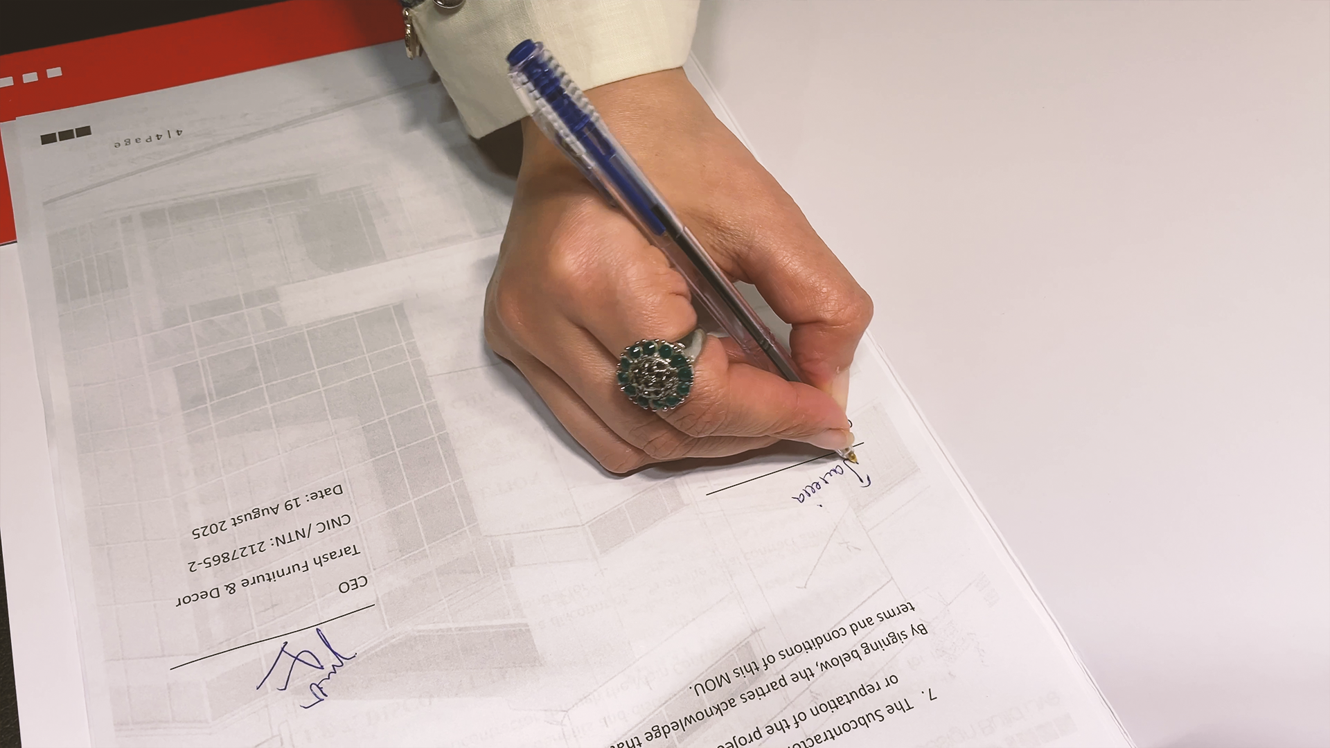 Rapid project onboarding meeting at DBL – Design Build Live Islamabad office with architects and clients reviewing plans