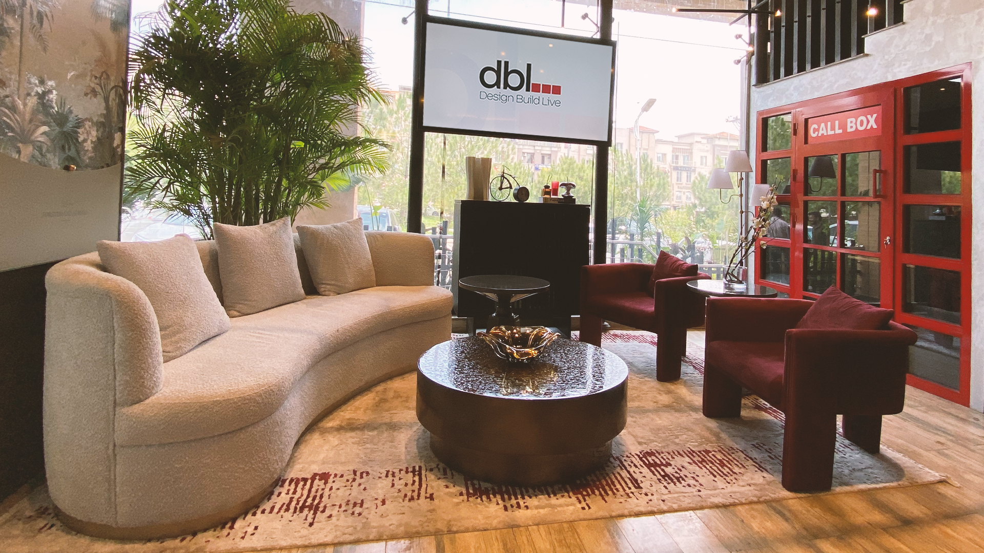 Design Build Live office reception interior in Islamabad with company branding display